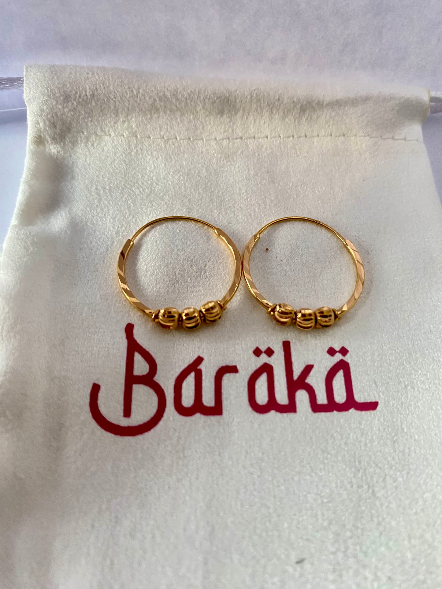 Hyacinth 21 karat pure gold earrings